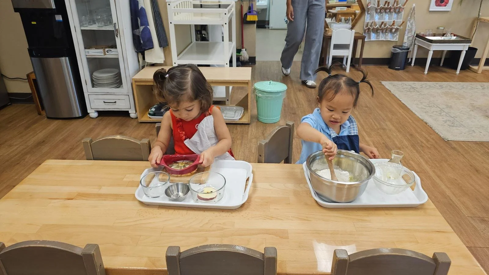 Alana Apple slicing Amelia cornbread.jpg