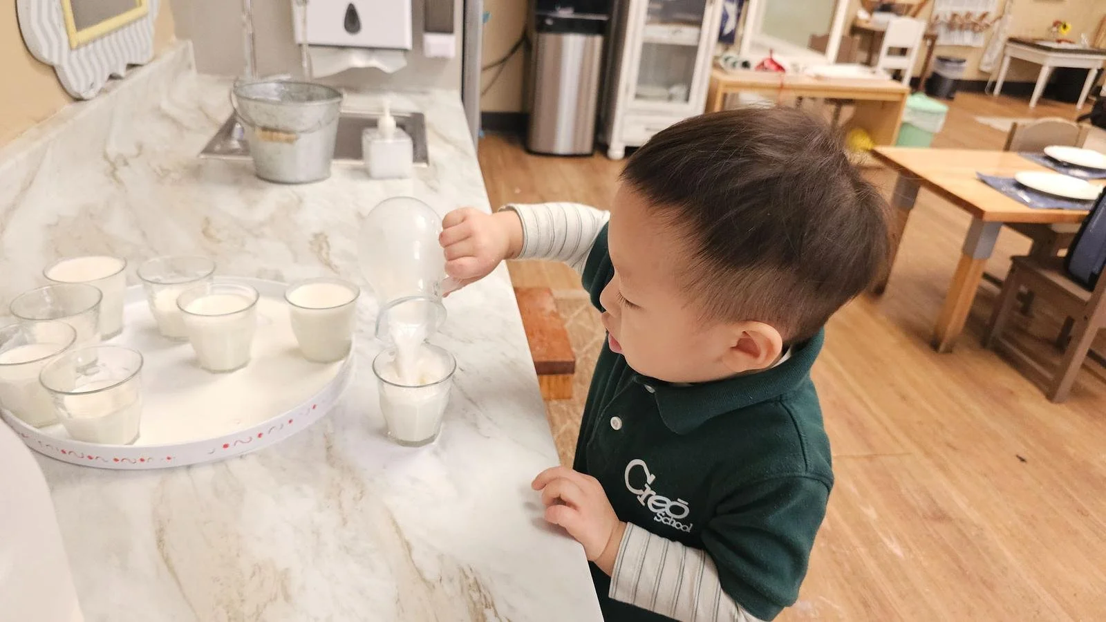 Ian pouring milk.jpg