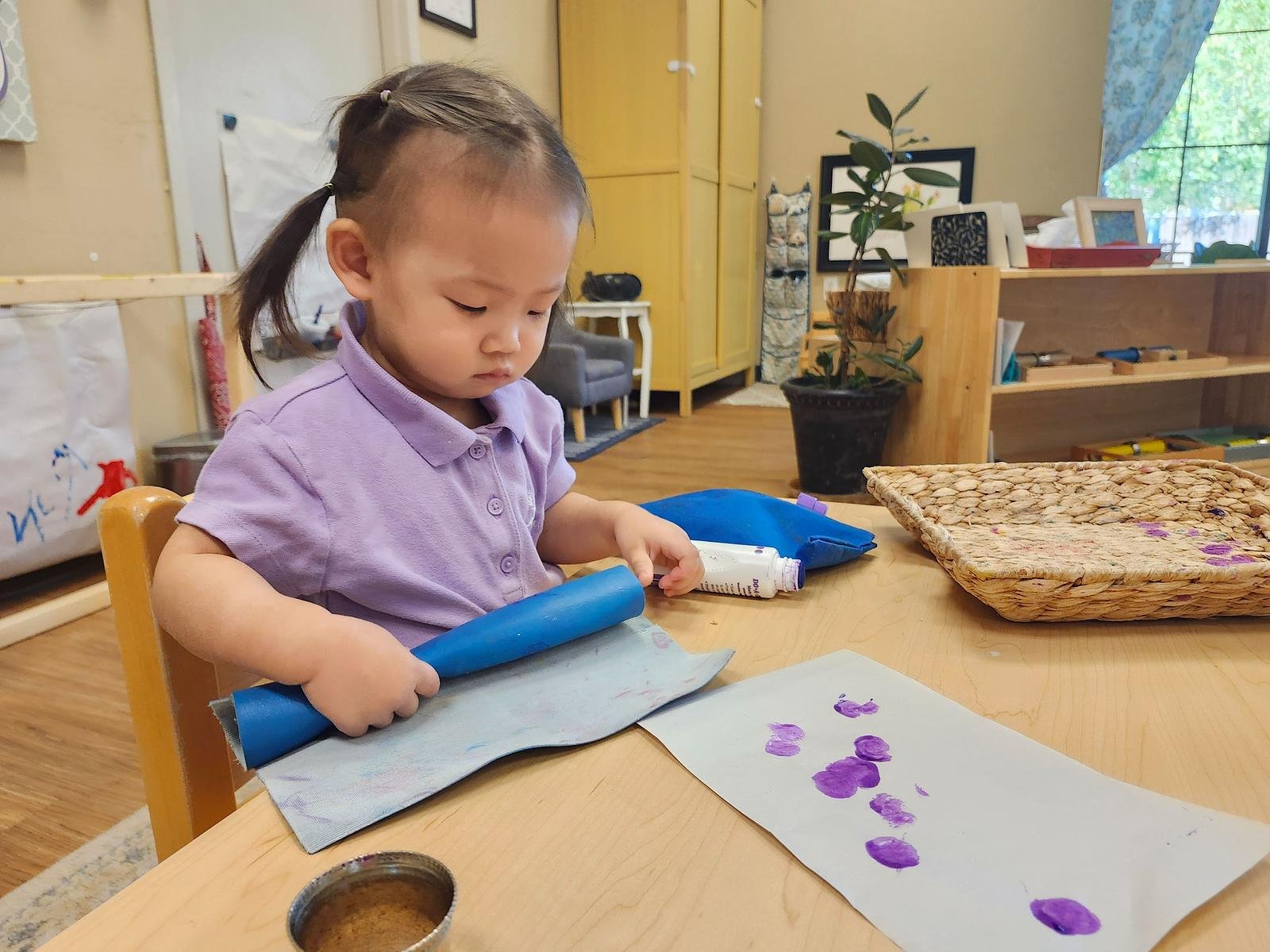 Leona rolling up work mat.jpg