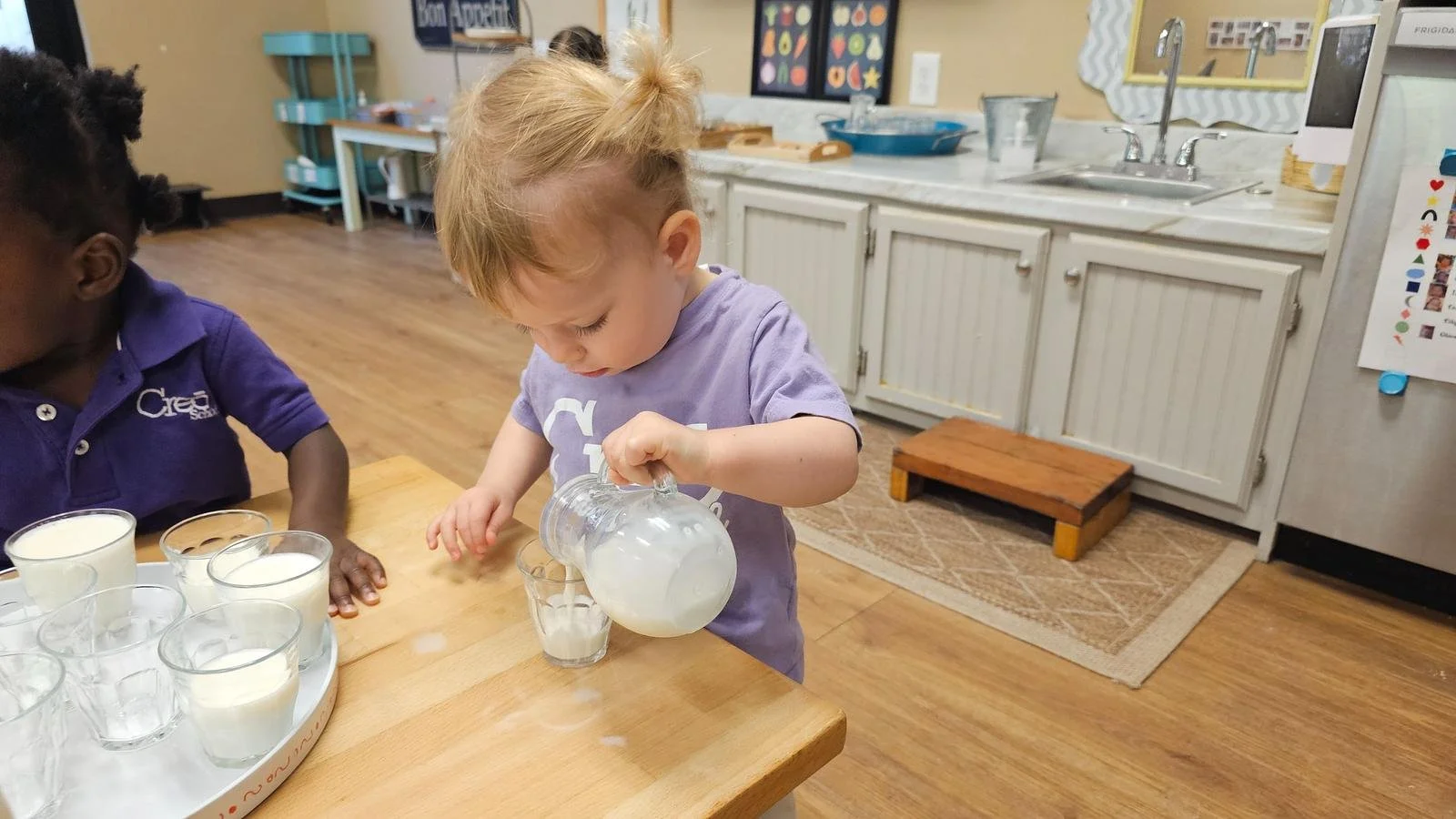 Olive pouring milk.jpg