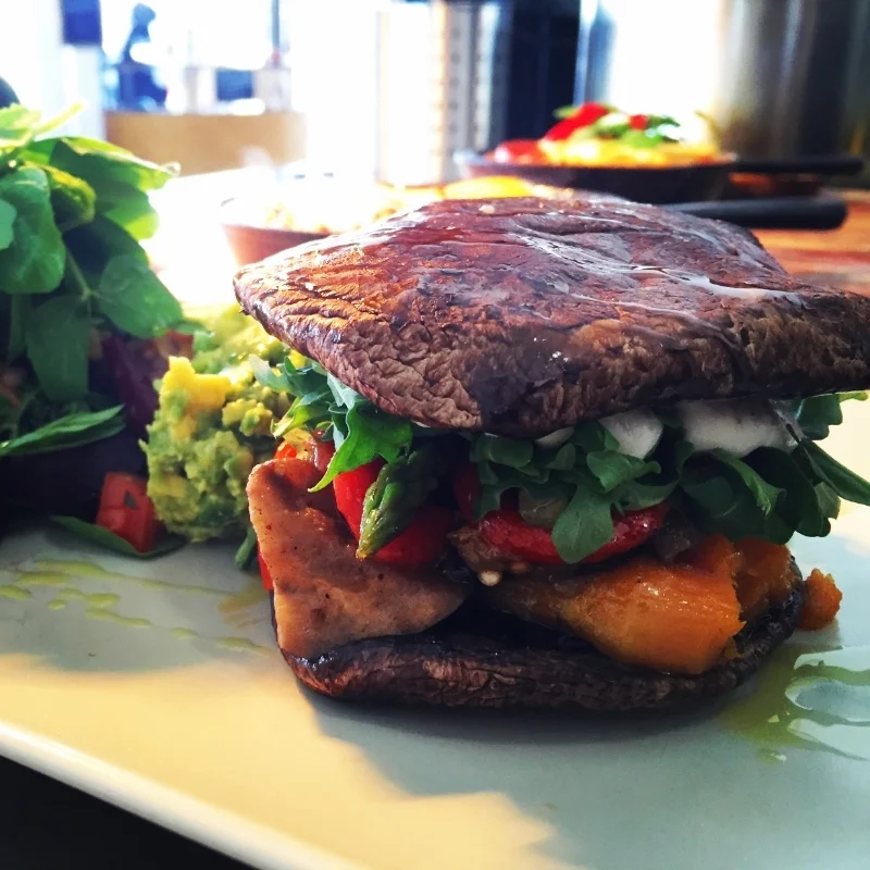  Vegan Burger with roasted vegetables and almond mayonnaise.   