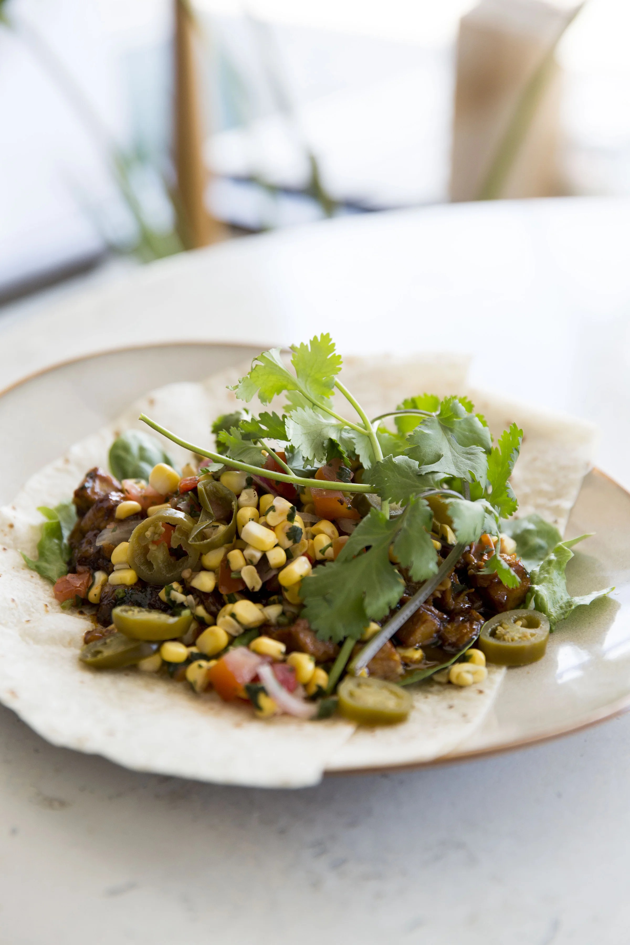  Pulled pork with charred corn, beans and jalapeño 