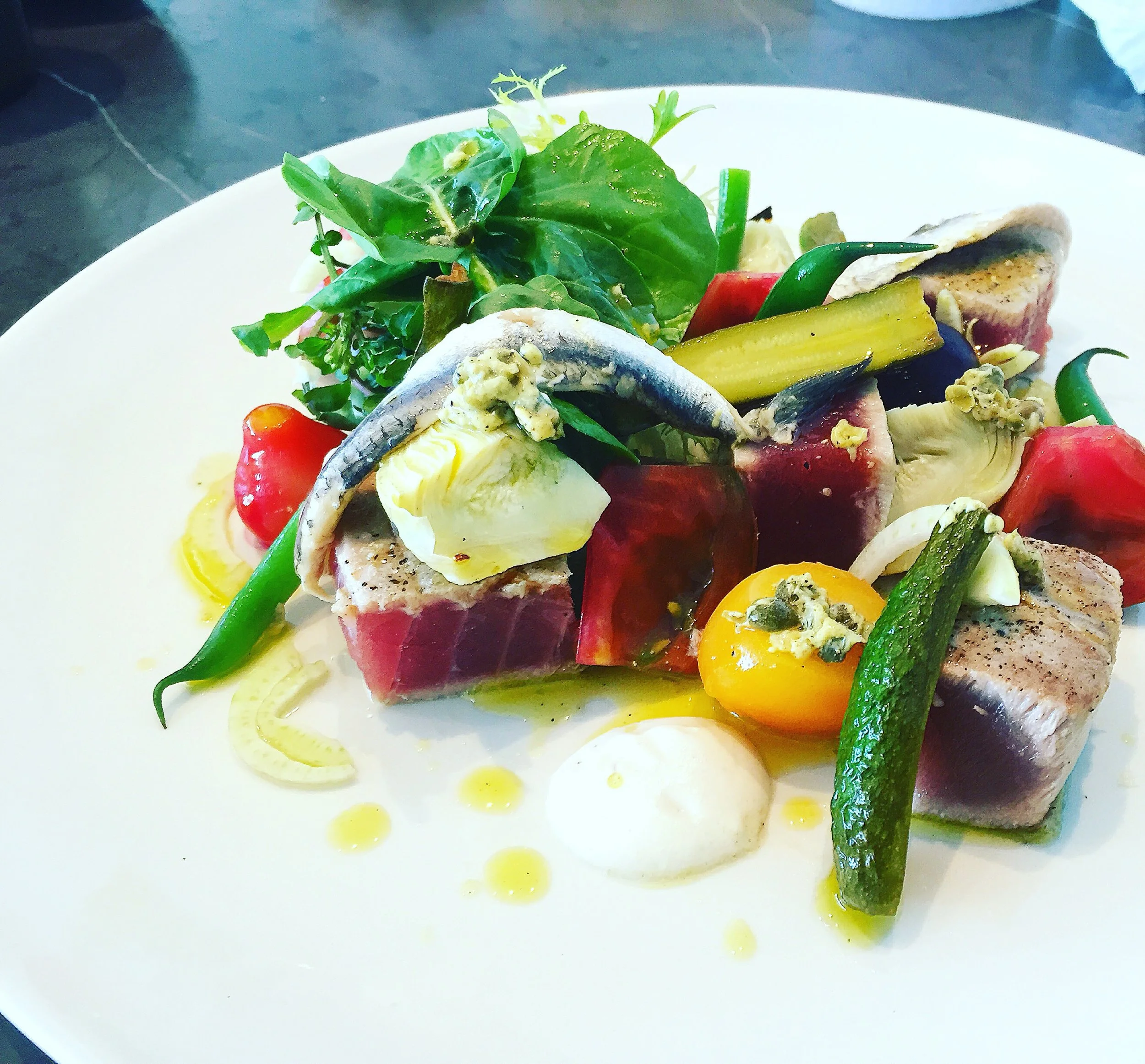 A salad of Tuna, White Anchovies, Heritage Beets and Tomatoes