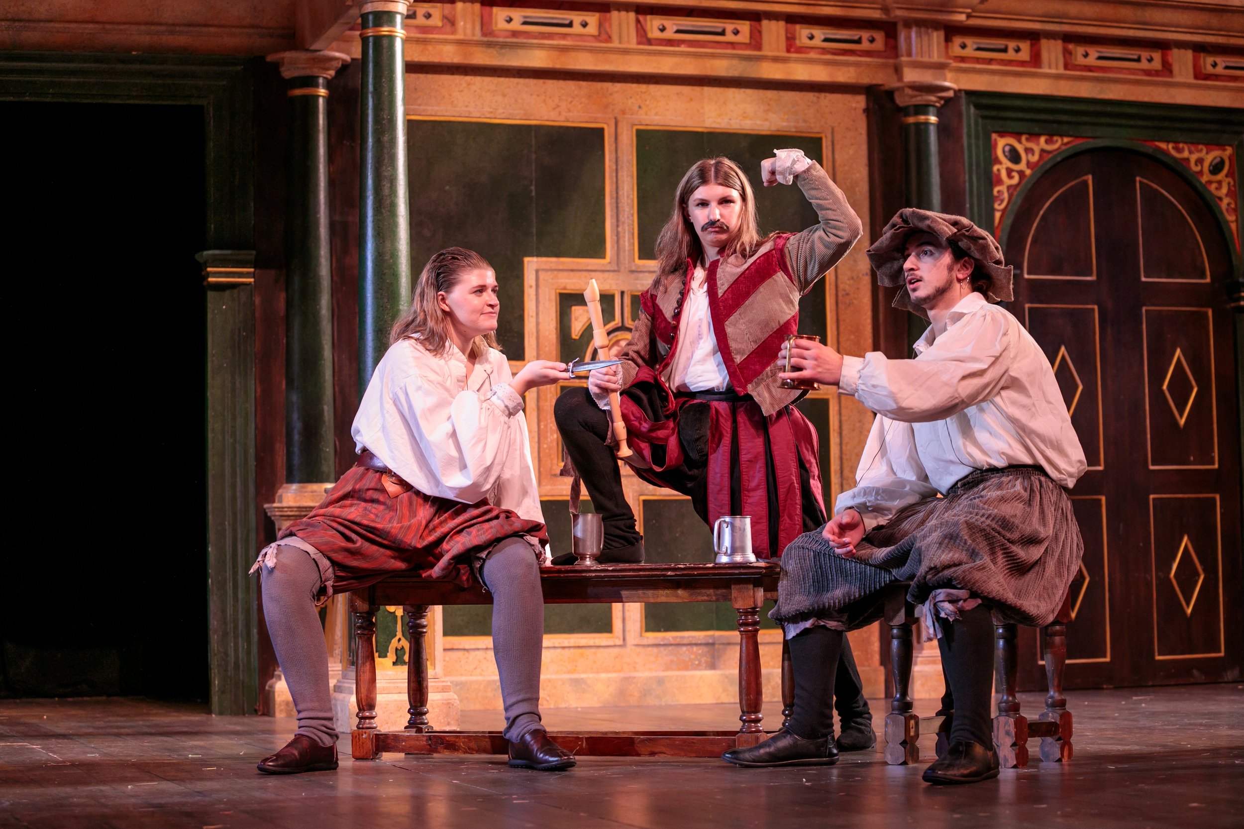  Nym (Jessica Wimmenauer), Pistol (Annie Holstein), and Bardoph (Ryan Pereira).  The Merry Wives of Windsor , Hofstra University, 2023. Photo by Trent Campbell. 