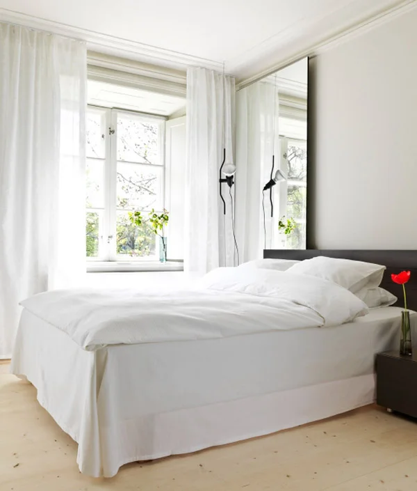 hotel-skeppsholmen-suite-bed-daylight-d-03-x2.jpg