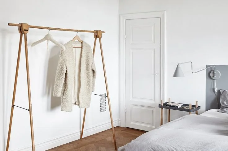 White Scandinavian home with herringbone parquet flooring