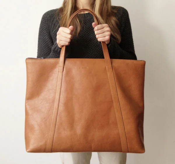 Tan leather carryall weekend tote