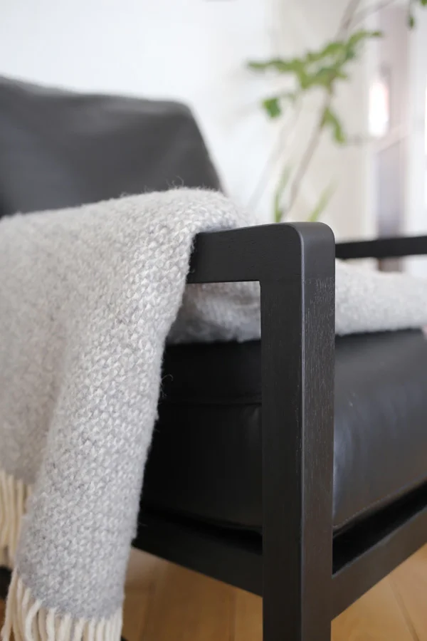 Black leather chair by Camerich | Design Hunter