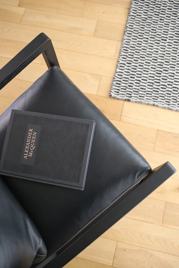 Black leather armchair by Camerich | Design Hunter