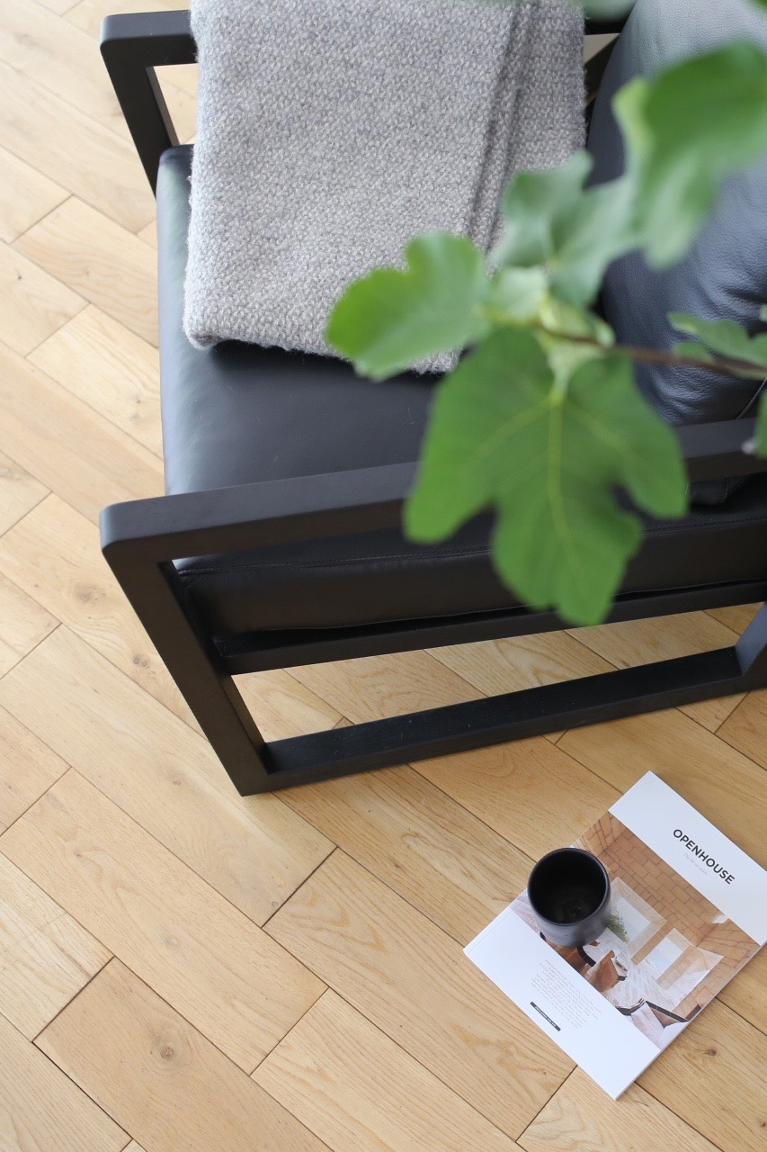 Black leather armchair by Camerich | Design Hunter