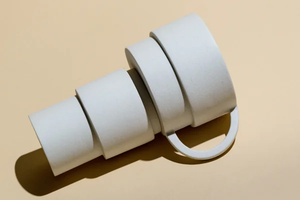 Sand mug and vase by Nobel