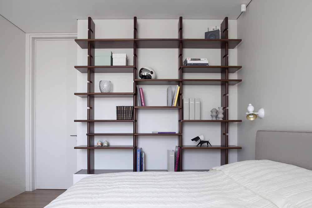 Wall shelving in Moscow apartment by FORM Architects