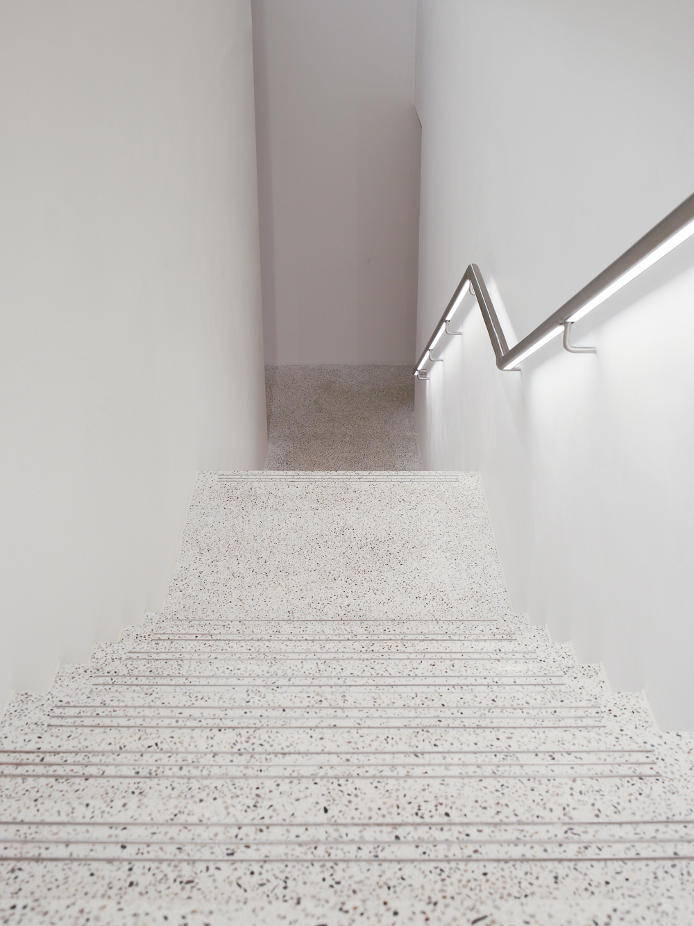 White terrazzo staircase at the Design Museum | John Pawson