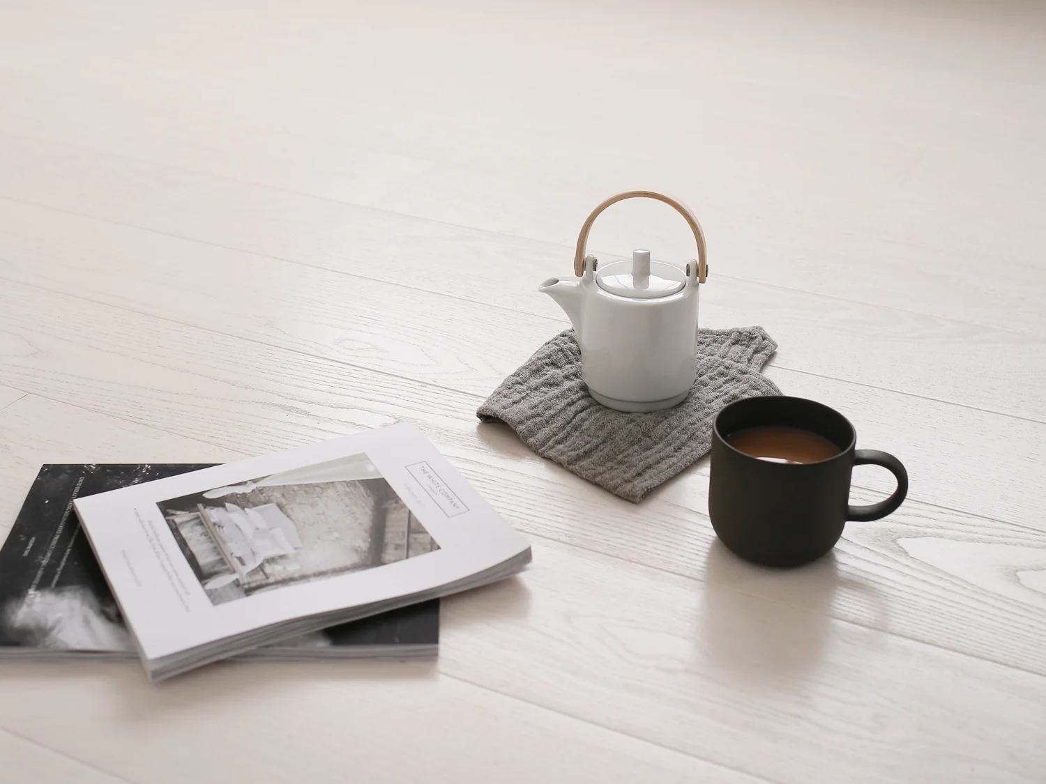 Tea on white ash studio floor | Design Hunter