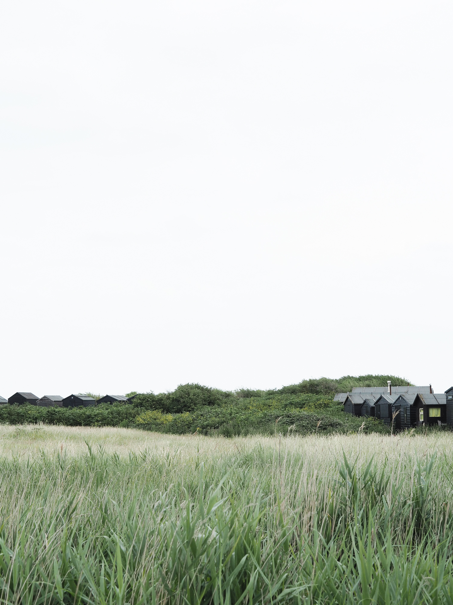 Black beach huts at Walberswick in Suffolk | Design Hunter