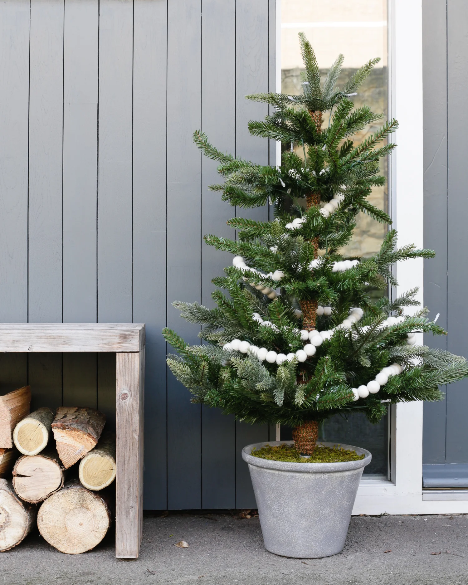 Festive door with Christmas tree by The White Company | Design Hunter