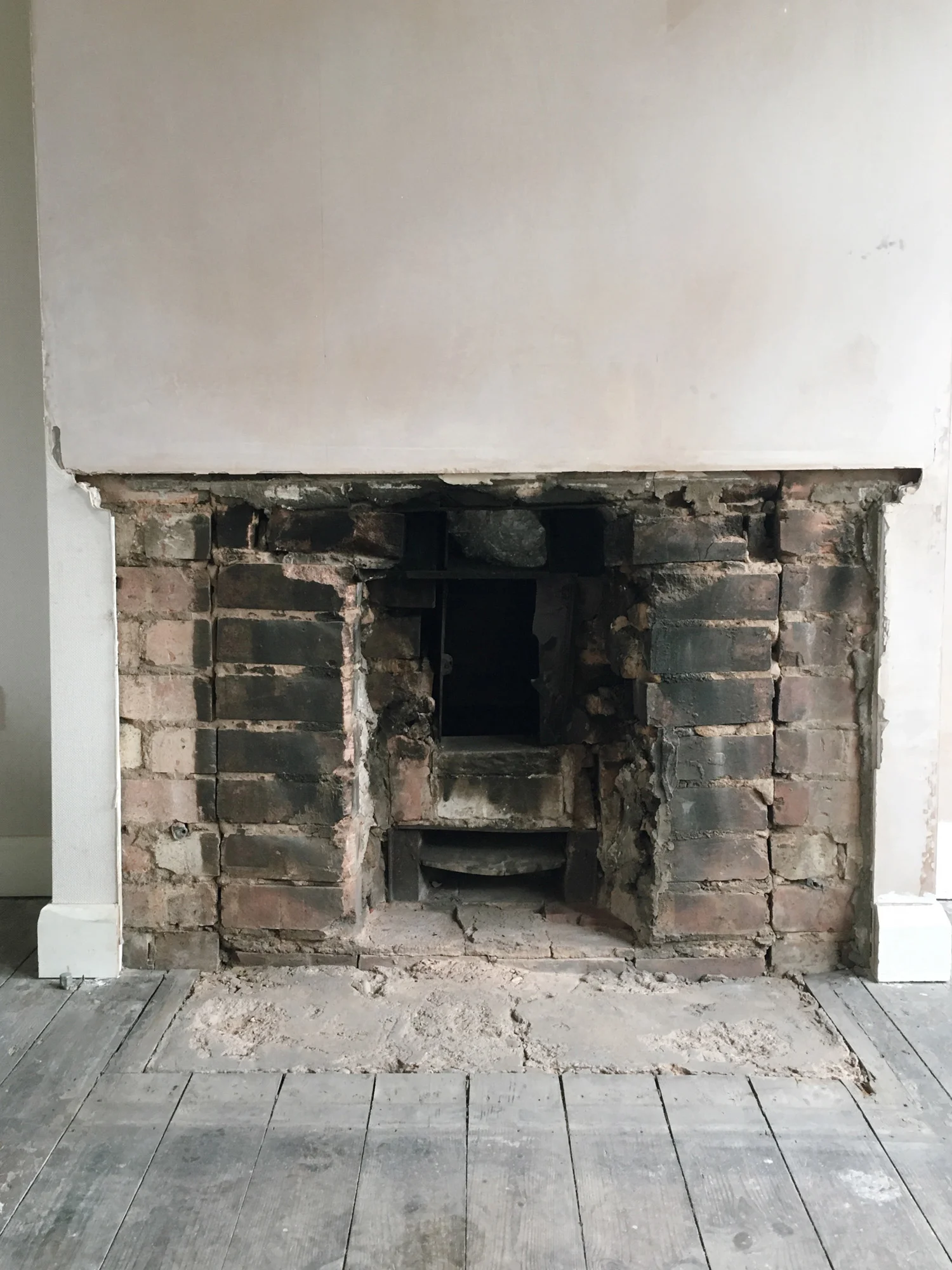 Removing the fireplace for a woodburner.jpg