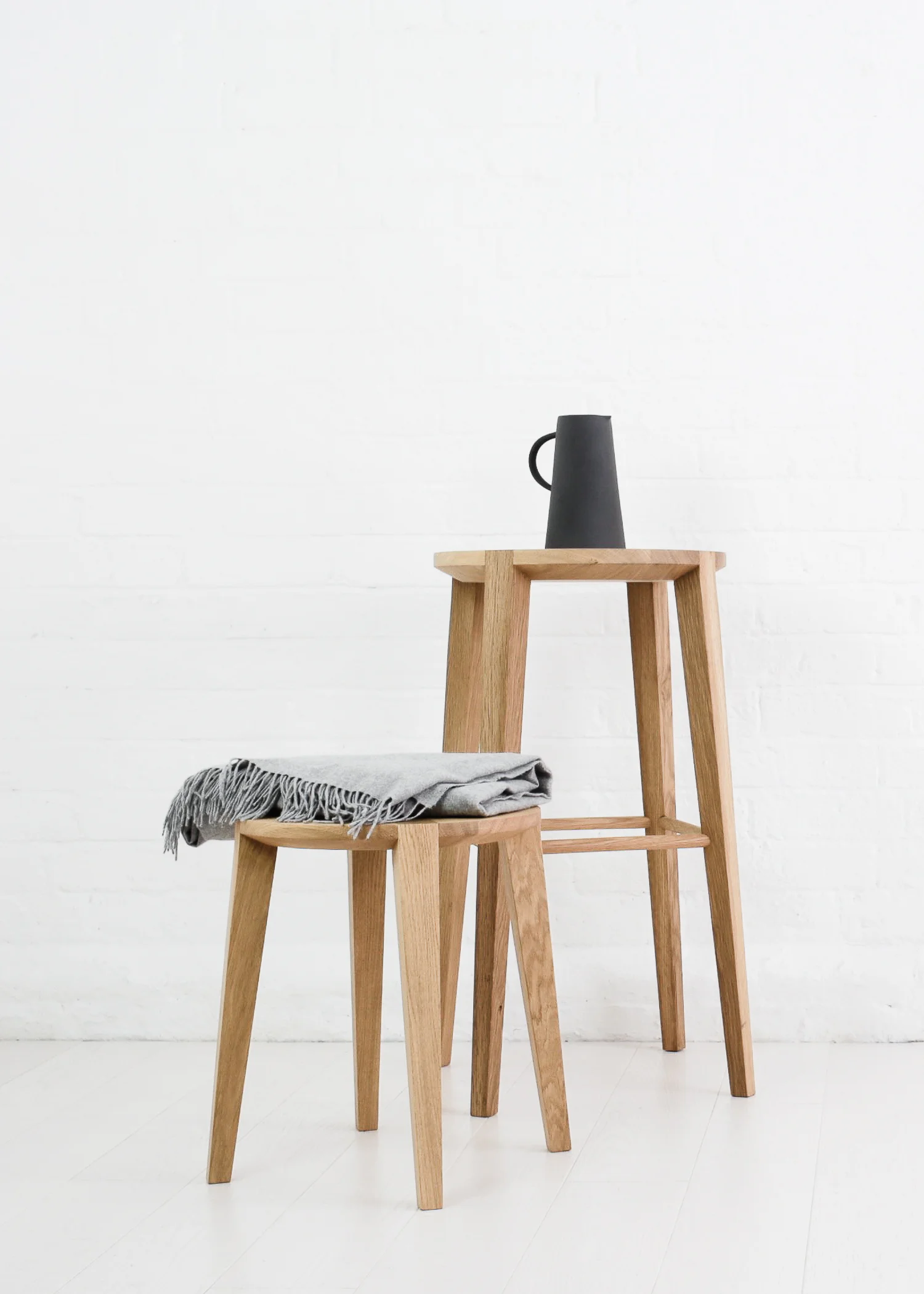 Lara bar stool and Lara small side table by Carsten Astheimer