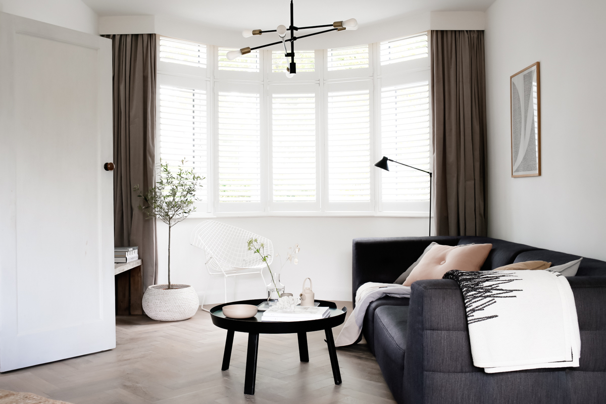 Shutters by Apollo Blinds in bay window - Design Hunter living room-1-8.jpg