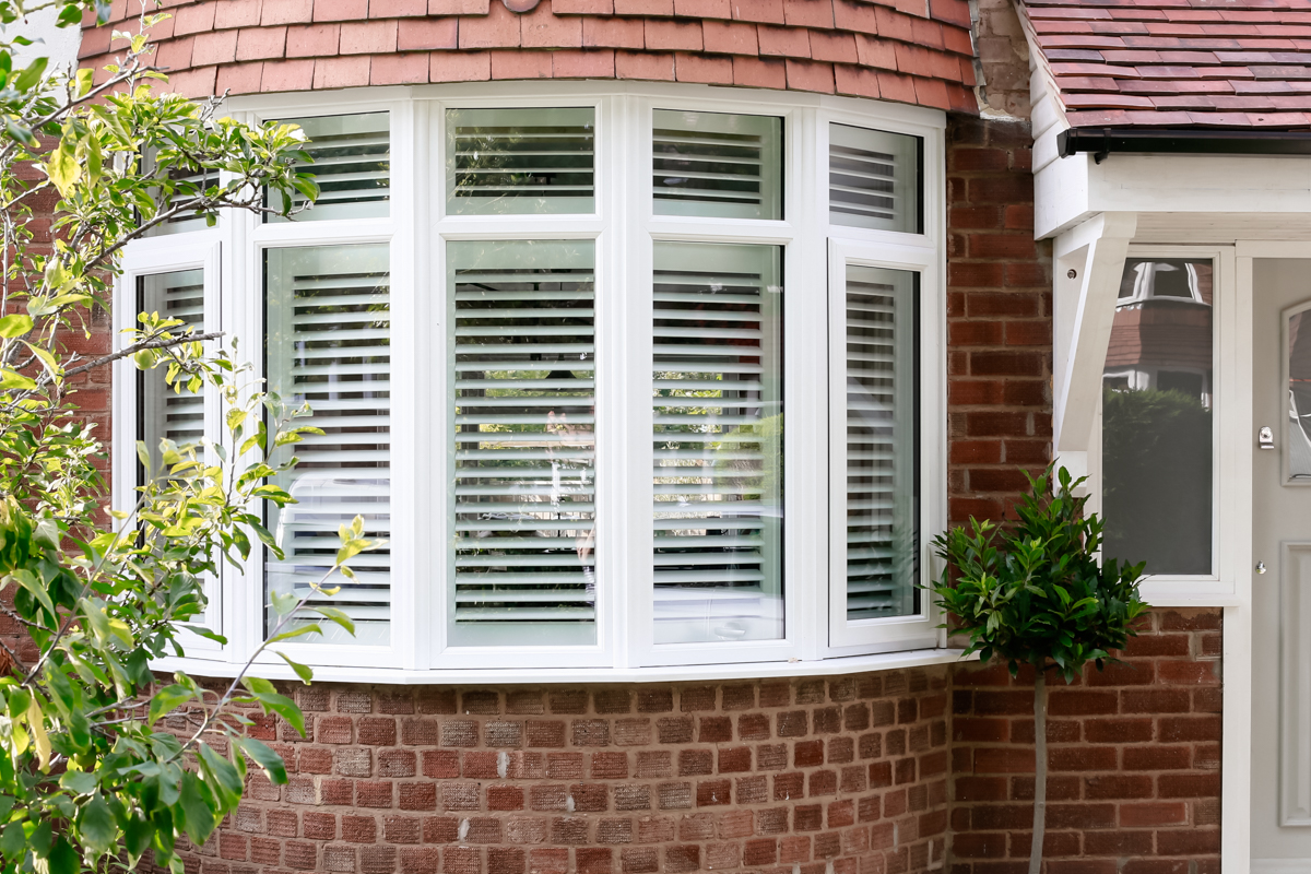 Shutters in 1930s bow bay window - Design Hunter-1.jpg