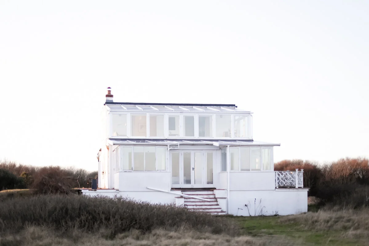 White house on the beach at Thorpeness.jpg
