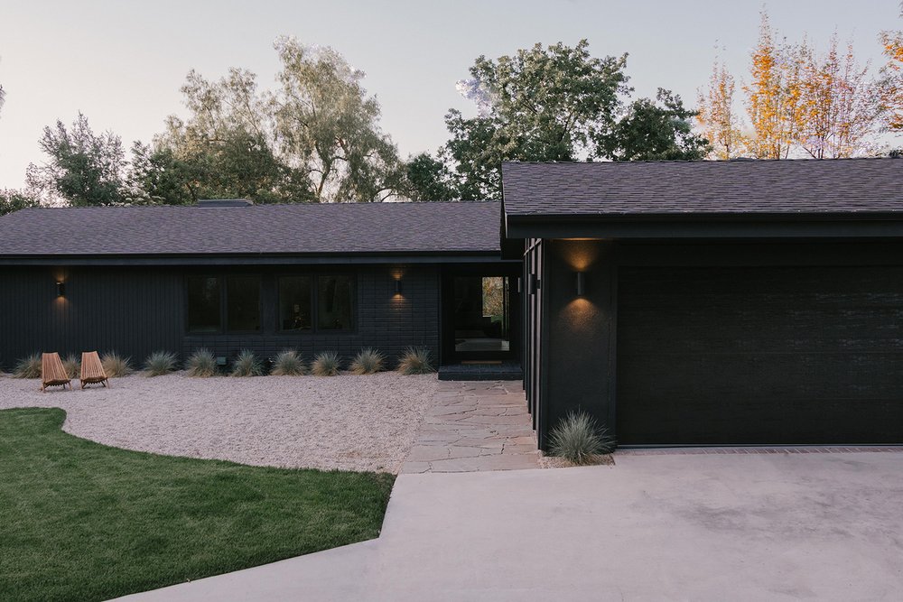A black ranch style bungalow in California