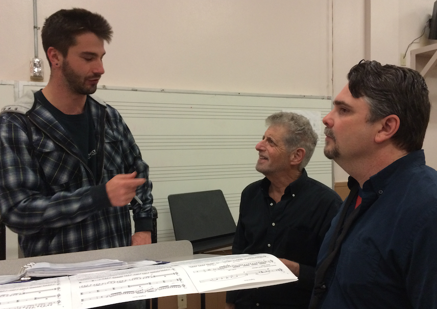 Stefan Cwik, Stephen Paulson, and Russ deLuna discuss Cwik's English horn concerto during rehearsal