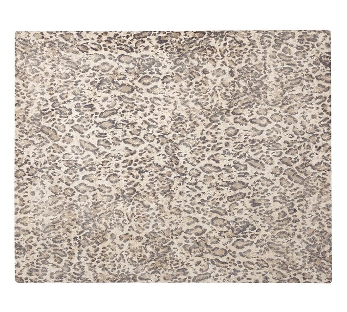 This Cheetah print inspired carpet is from Pottery Barn. This is the perfect grounding element for all the pieces above. It is always fun to add an animal print to any space. 