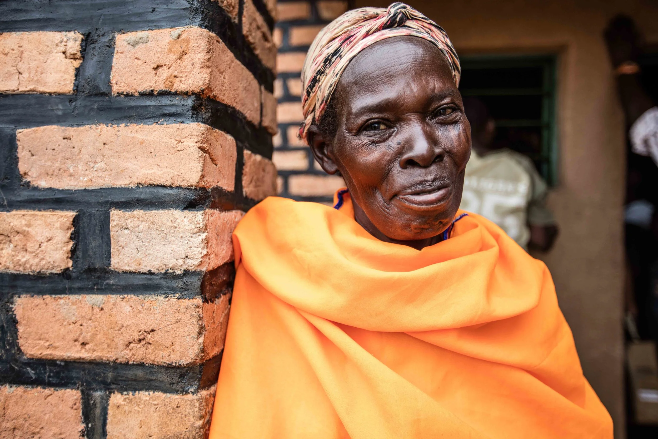 Lady in orange (1 of 1).jpg