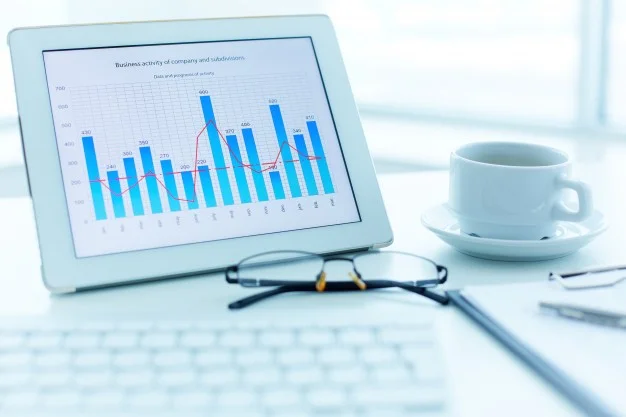 close-up-of-digital-tablet-with-bar-graph_1098-3523.jpg