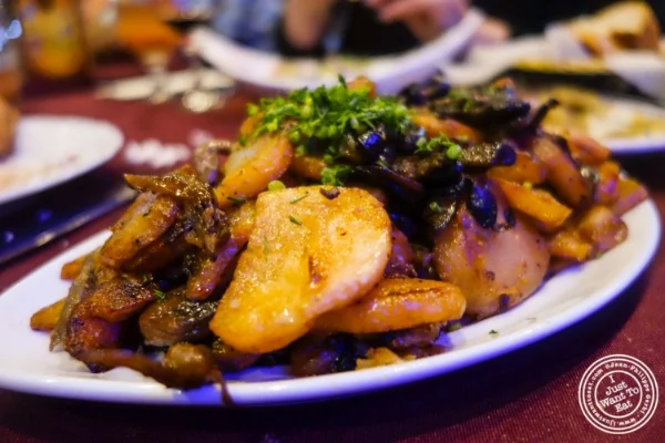 Potatoes with mushrooms and onions at Nargis Café in Brooklyn, NY