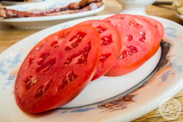 Sliced tomato at Peter Luger Steakhouse in Brooklyn, NY