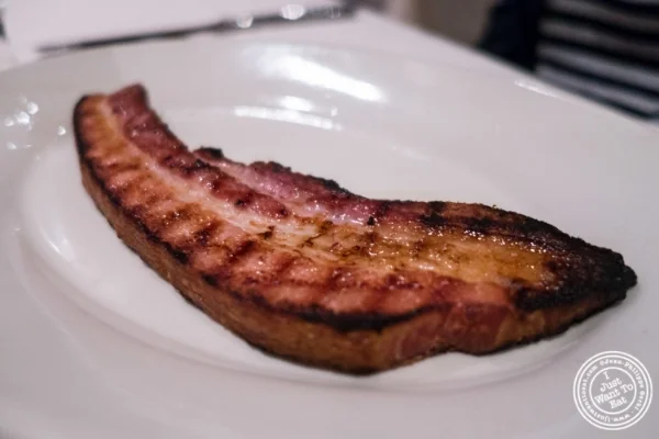 Thick Slab of Canadian Bacon at Angus Club Steakhouse in New York, NY