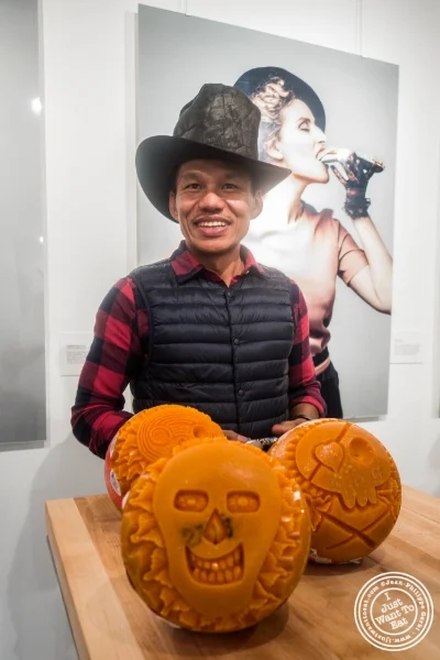Artist Krai carving mimolette for Halloween at The French Cheese Board
