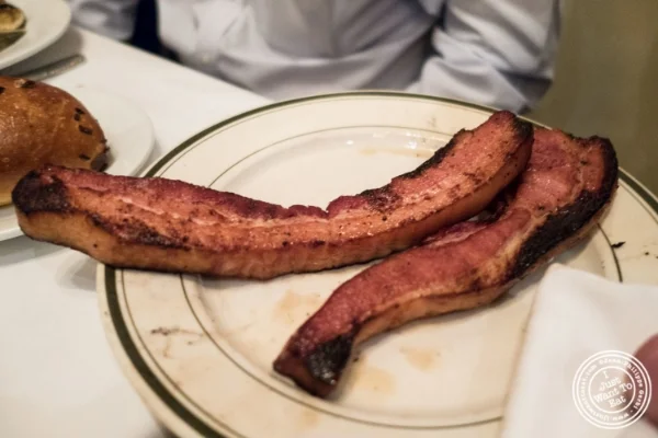 Slab of Canadian bacon at Benjamin Steakhouse in New York, NY