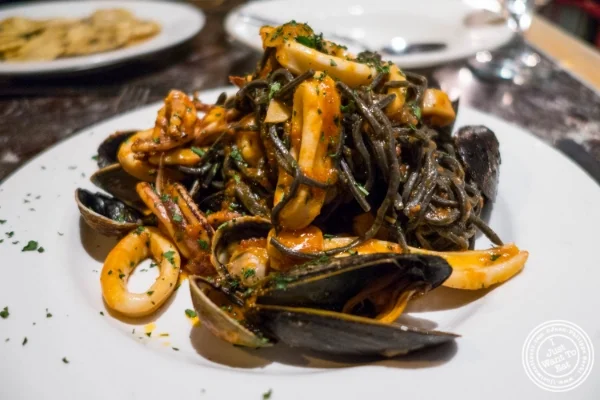 Black linguine with seafood at Petrarca Cucina e Vino, Italian restaurant in Tribeca, NYC, New York
