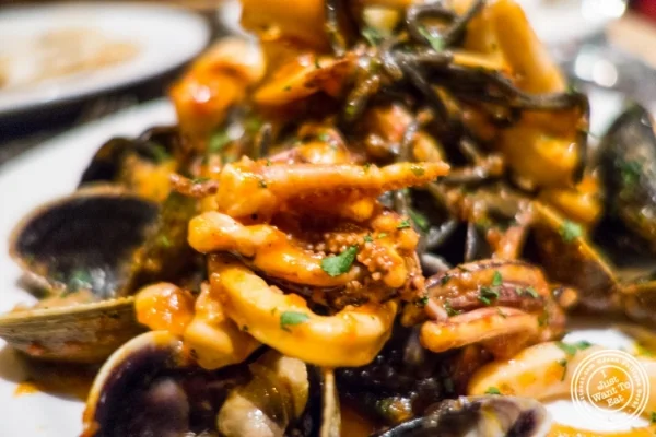 Black linguine with seafood at Petrarca Cucina e Vino, Italian restaurant in Tribeca, NYC, New York