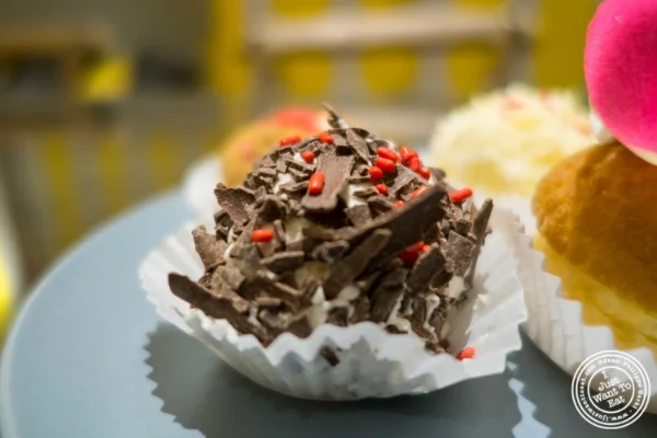 Merveilleux with dark chocolate at O Merveilleux in Yorkville, NYC, New York