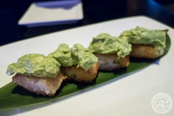 Crispy rice with avocado at Koi Soho in the Trump Hotel, NYC, New York