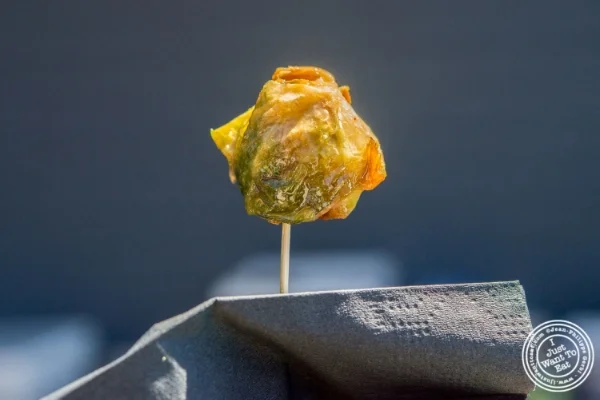 Brussels sprout dipped in a bacon marinade from The East Pole at Bacon and Beer Classic 2015 At Citi Field