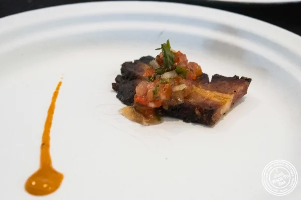 Cured bacon with tomato chimichuri at Strip House at Bacon and Beer Classic 2015 At Citi Field