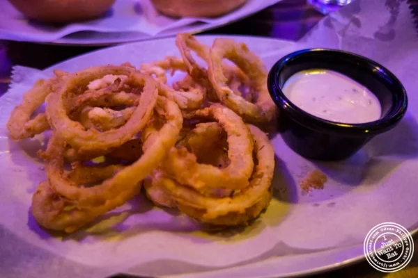 Onion rings with ranch dressing at Black Iron Burger in Chelsea, NYC, New York