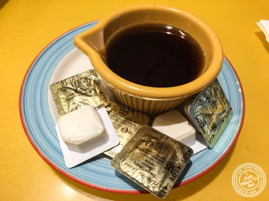 Maple syrup and butter at Tick Tock Diner in NYC, New York