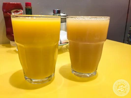 Fresh squeeze orange and grapefruit juices at Tick Tock Diner in NYC, New York