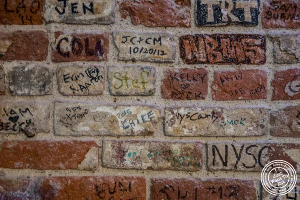 Brick wall at Jeremy's Ale House in NYC, New York