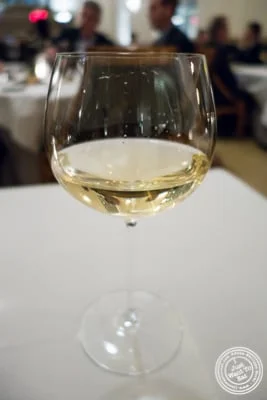 Glass of 2012 Chablis Premier Cru "Montée de Tonnerre" at Eleven Madison Park in NYC, New York