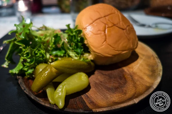 Pickles and peppers with merguez burger at Combina in TriBeCa, NYC, New York