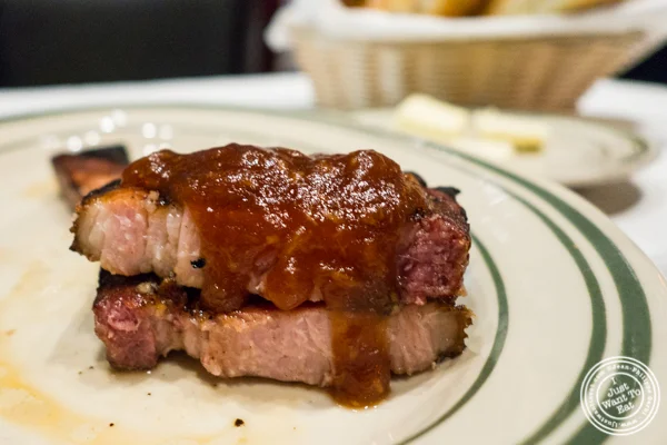 Canadian bacon with steak sauce at Rocco Steakhouse in NoMad, NYC