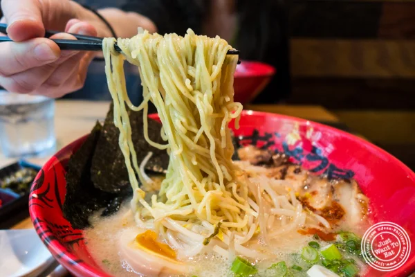 Thick-wavy noodles in Zonbunose ramen at Ramen Zundo-Ya in NYC, New York