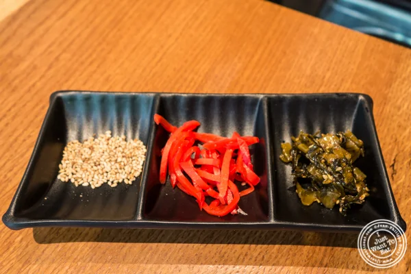 Condiments for ramen at Ramen Zundo-Ya in NYC, New York